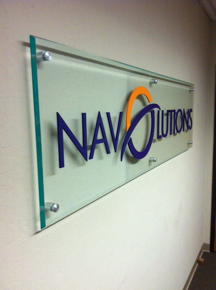 Lobby signage on glass installed in Pleasanton for Navolutions