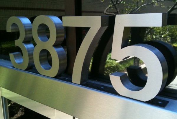 T. Bennett Services, LLC made Channel Letters address for Harsch building