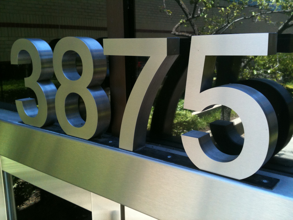 T. Bennett Services, LLC made Channel Letters address for Harsch building