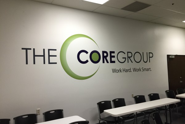 finished vinyl wall logo for the core group